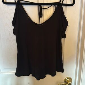 Size XS black, cold shoulder w ruffle, very soft tee shirt by HIP. Tie in back.